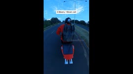 Motorcyclists' hilarious synchronised head tilt as they speed round bend