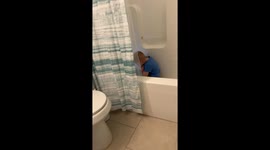 Kid Shares Tub Screen Time With Cat