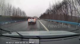 Driver navigates through still cars after possible accident in Zhejiang, China