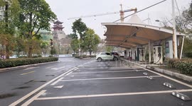 New energy vehicles are charged at a charging station in Enshi, China