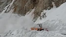 Snow clearance work underway at road in northern India