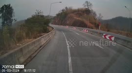 Two trucks crash inches from driver on winding mountain road