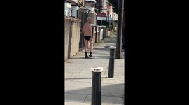 Man in his underpants confronts police in the street with two-foot-long machete