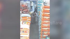 Woman crushed by tower of grain bags at Indian factory