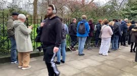 Massive queues of voters and protesters outside the Russian Embassy in London