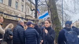 Russians in London form mammoth queue outside national embassy as thousands arrive to play their part in the election