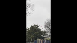 Cupid's at work: Wind blows heart-shaped balloon into path of passing motorcyclist