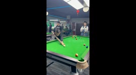 Chinese man uses branch as cue stick in billiards game