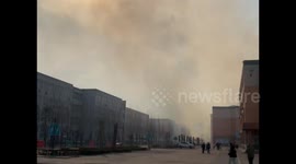 Thick Smoke Obscures Sky as Chinese University Road Catches Fire