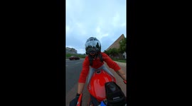 Biker has close call with petrol tanker crossing the road ahead