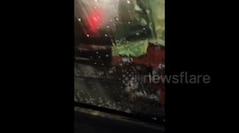 Freezing Rain Immediately Forms Ice after Falling on Glass in Chongqing, China