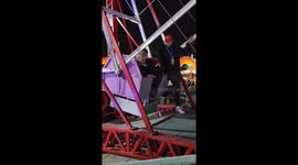 Dramatic Friend Celebrity Lookalike Gets off a Ferris Wheel