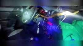 Driver's Shock as Snake Slithers Inside Car on Busy Road in adrid, Spain