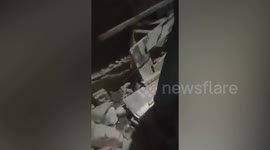 Two dead and more trapped as building collapses in India