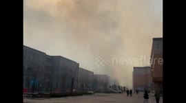 Thick Smoke Obscures the Sky as University Road Catches Fire in Langfang, China
