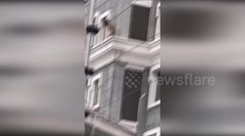 Army veteran, 56, risks life to rescue little girl from fifth-floor window ledge