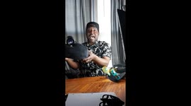 Man demonstrates his new invented travel pillow