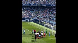 Football Player Races Paramedic Bag Across Pitch