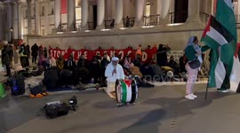 Pro-Palestine protesters pray in London's Trafalgar Square
