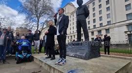 Actor Laurence Fox - wearing vintage Nike trainers speaks about England football shirt at the centre of flag row in London rally