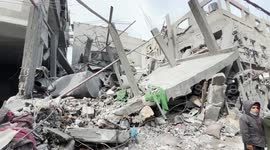 Medical teams recover the bodies of six martyrs from under the rubble in Rafah, Gaza
