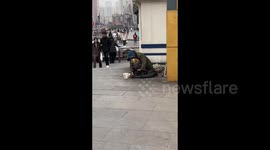 Homeless Man Lovingly Dresses Up His Dog as Street Icon in Liaoning, China