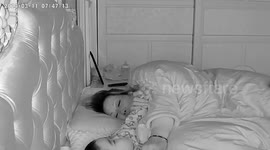 Mother and Child Awakened by Intrusive Mouse in Luzhou, China