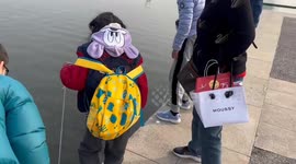 Children Take Their Turtles for a Stroll in the River in Jiang Su Sheng, China