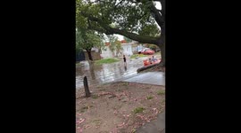 Argentina residents navigate flooded streets by canoe