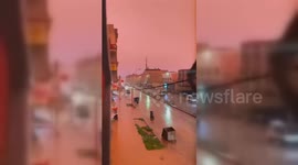 Sandstorm turns skies dark orange over Moroccan city