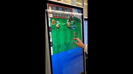 Leisure Time While Waiting: Chinese Subway Station with Screen for Playing Games