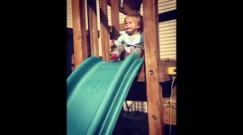 Toddler 'wipes out' on play area slide