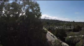 Drone crash prompts dramatic rescue from 100ft tree