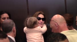  France's former First Lady, musician Carla Bruni Sarkozy catches a flight out of LAX with adorable daughter Giulia Sarkozy 