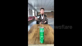 Man Masters Art of Throwing Cards and Needles in Henan, China