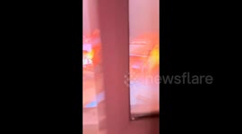 Woman's close encounter with lightning captured on camera during rainy day