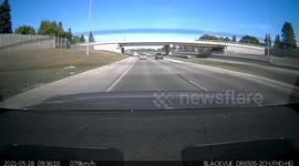 Distracted Driver Almost Accidentally Performs Pit Maneuver
