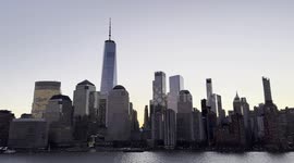 Sailing by the Iconic Skyline of Lower Manhattan's Financial District at Sunrise
