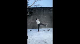 Man prepares handsome snow kick but things don't go as expected