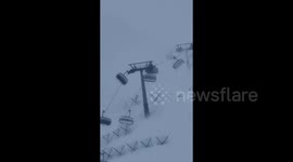 Chairlifts swung by violent winds at Italian ski resort