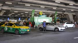 Ride-hailing app Grab opens booth at Bangkok's main airport