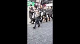 China’s only police Corgi dog spotted to be carried on policeman’s back during patrolling