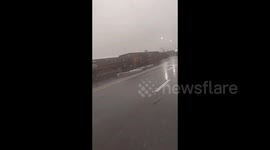 Fierce storm overturns semi-trailers at Chinese logistics park