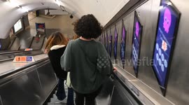 Going down the escalators within Waterloo Station, London, United Kingdom