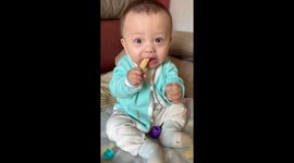 Chinese Baby Inexplicably Trembles As He Eats Teething Toy
