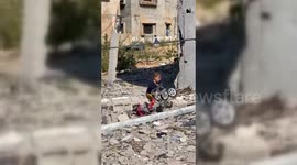 Gaza Boy Finds Bike Under House Rubble in Khan Yunis