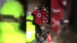 People search through the rubble after Israeli bombing on Sultaniyeh, Lebanon