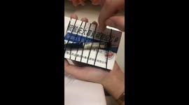 Chinese Woman Crafts Miniature Guzheng from Medicine Boxes