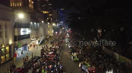 Decorated float parade on the night of 1 Shawwal 1445H