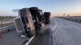 Semi-truck rolls over in crash with trailer on highway in Washington